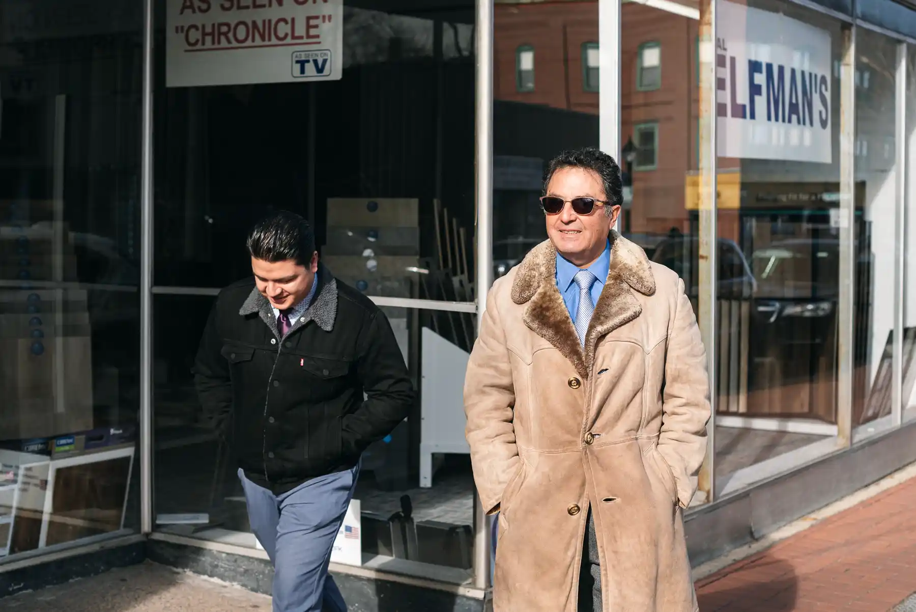 A capture of two men walking home after Sunday service.